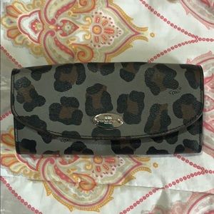 Gray leather coach wallet